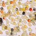 Macro shot of colorful square acrylic beads with marble texture for DIY jewelry making - 20 Pieces Set / Earthy Yellow