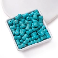 Macro detail of turquoise bone beads showing natural brown marble texture and dimensions - Bone Style / 8*13.5mm (approx. 29 pcs/strand)