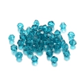 Détail macro de perles en cristal de verre facetté bleu paon 4mm pour bijoux DIY - Transparent Bleu Paon