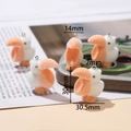 Detail showing dimensions of miniature flocked pelican charms with metal loop for DIY crafts - Pelicans
