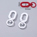 Detailed view of red and white alloy lobster clasps with size markings 39.5x16mm - 14g / White