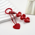 Detail of red heart charms keychain with spring clasp and branded metal nameplate - Red Heart