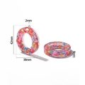 Detailed view of clear resin rings with heart sequins and dimensions of 42mm and 38mm - Letter O