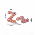 Detail view of pink sequin letter Z resin pendant with specific size measurements - Letter Z