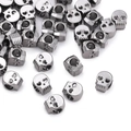 Vue détaillée de perles tête de mort en alliage avec trous pour la création de bijoux - Lot de 10 / Noir Fusil