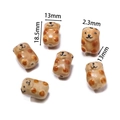 Detail view of 18.5x13mm brown ceramic bear beads for DIY handmade jewelry crafts - Bear