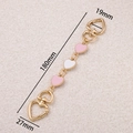 Detailed view of the 180mm gold bag extension chain with pink heart charms and heart clasps - Enamel Heart Decor Style (Model 04)