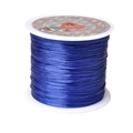 Close-up detail of a spool with vibrant blue 1mm elastic string for DIY jewelry - Width 1mm, Length 40m (18g) / Sapphire Blue