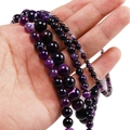 Detalle de cuentas de ágata natural con rayas moradas en varios tamaños para joyería - 6mm / Púrpura
