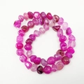Macro detail of irregular deep pink dragon vein agate nugget beads for jewelry making - Standard Spec / Rose Red