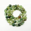 Irregular green dragon vein agate stone beads arranged in a spiral on white background - 10mm / Green