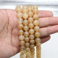 Natural golden rutilated quartz round beads for DIY bracelet jewelry making - Medium Size