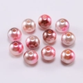Macro shot of 11 gradient pink round ABS imitation pearls with holes for DIY jewelry - Pink Brown Multicolor