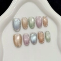 Cat eye kunstnagels set met glitterranden in blauwe, oranje en paarse tinten - XS