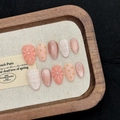 Japanese peach cat eye press-on nails with 3D floral accents and elegant grid patterns - S / Ice-Through Milk Tea Nude (Short Almond)