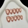 Unghie finte a mandorla effetto cat eye magnetico con finitura rosata scintillante - XS / Forma a Mandorla / Albicocca