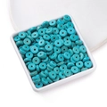 Flat turquoise heishi beads for DIY jewelry making displayed in a white square tray - 2.5*8mm (approx. 138 pcs/strand)
