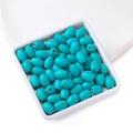 Blue oval turquoise loose beads with natural brown veins in white ceramic tray - 8*11mm (approx. 35 pcs/strand)