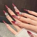 Deep burgundy cat-eye stiletto press-on nails with 3D flowers and crystal accents - XS / Slender Stiletto