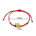 Red braided cord bracelet featuring a gold horse charm and heart detail for New Year - 1 Piece / Love Fortune Horse