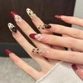 Unghie finte bordeaux con petali di fiori 3D e decorazioni di cristalli lucidi - XS / Ovale Lungo