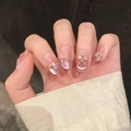 Pink cat eye press-on nails with rhinestone butterfly and flower accents on long oval tips - Short Oval Style (1138-短椭圆)