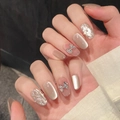 Champagne cat-eye press-on nails with silver argyle pattern and rhinestone bow accent - XS / Short Oval Style (1110)