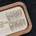 Handgemaakte zilveren cat-eye kunstnagels met vlinderstrikjes en sprankelende strass-steentjes - XS / Lange Ovalen Kattenoog Vlinder