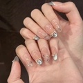 Uñas postizas French cat eye con lazos rosas 3D y pedrería de cristal - XS / Ovalado Mediano