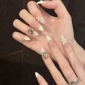 Uñas postizas de almendra francesa con lazo crema, perlas y piedras de ámbar - Forma de Almendra (884) / XS
