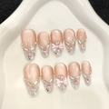 Kit de faux ongles œil-de-chat roses avec dégradé pailleté et nœuds 3D décoratifs - XS / Ovale mi-long