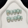 Unghie finte corte occhio di gatto verde menta con fiocco di diamanti 3D e decori - XS / Bara Corta (1543)