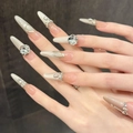 Handgemaakte stiletto plaknagels met kattenoogeffect en luxe steentjes in nude roze - XS / Dunne Stiletto Stijl (2883)