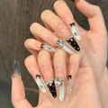 Uñas postizas rosa y negro con lazos, pedrería brillante y efecto ojo de gato - XS / Stiletto Fino