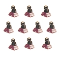 Detailed view of 10 purple book and black cat enamel charms for DIY jewelry making - Black Cat Sitting On Magic Books
