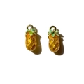 Detailed close-up of pineapple fruit pendants with golden edges and colorful enamel inlay - 5# 3D Pineapple