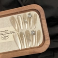 Champagne cat-eye press-on nails with luxury rhinestones and crystals on a wooden tray - XS / Slender Stiletto Style (2614)