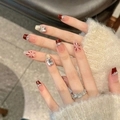 Deep red French cat-eye press-on nails with sparkling rhinestones and winter star patterns - XS / Short Coffin
