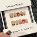 Handmade leopard print press-on nails with 3D red bows in a white gift display box - XS / Extra Short Trapezoid Style (2388)