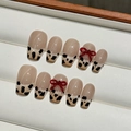 Handmade leopard print french press-on nails with 3D red bows and nude base - XS / Short Trapezoid Style (2272)