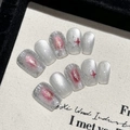 Unghie finte artigianali occhio di gatto argento con stelle rosse e sfumature eleganti - XS