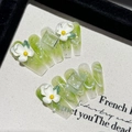 Green cat-eye press-on nails with 3D white flowers and pearls in medium coffin shape - Extra Small (XS)