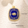 Makroaufnahme von blauem Emaille Evil Eye Anhänger mit Goldbeschichtung und Zirkon - Exotischer Blauer Emaille-Anhänger (A0743)
