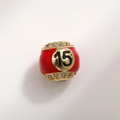 Detailed view of red enamel number 15 bead charm with micro-pave zircons and gold plating - Number 15 Billiard Style