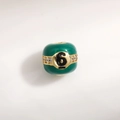 Macro shot of green enamel billiard style bead with gold number 6 and zircon stones - Number 6 Billiard Style / Green