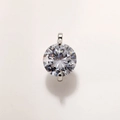 Close-up of a sparkling round-cut crystal pendant in a gold-plated hexagram setting - 8mm Silver Clear A0210