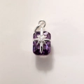 Macro view of gold-plated rectangle purple zircon pendant with star motif and tiny crystal - Silver Purple A0210