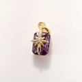 Detailed close-up of purple crystal pendant with gold starburst and white zircon inlay - Purple Gold A0210