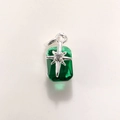 Macro view of green emerald-cut crystal pendant with gold-plated star detail - Silver Green A0210