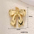 Detail of a gold-plated bow pendant with 26x22mm dimensions and 5.2g weight measurement - Bowknot Polished Style (15)